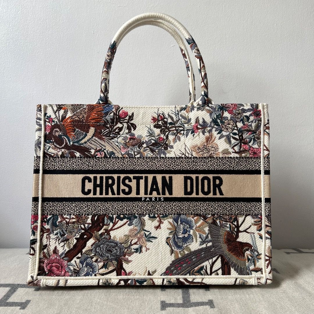 Dior Medium Book Tote Bag (Category: Luxury Bags & Wallets) located in Antipolo. Submitted by chanchimj (Listing ID 1325367736, Image 1). Description: The bag's large size can accommodate a 15-inch laptop, a pouch, a wallet, a phone, sunglasses and lipstick 14 x 11 x 6.5 inches Dust bag included.