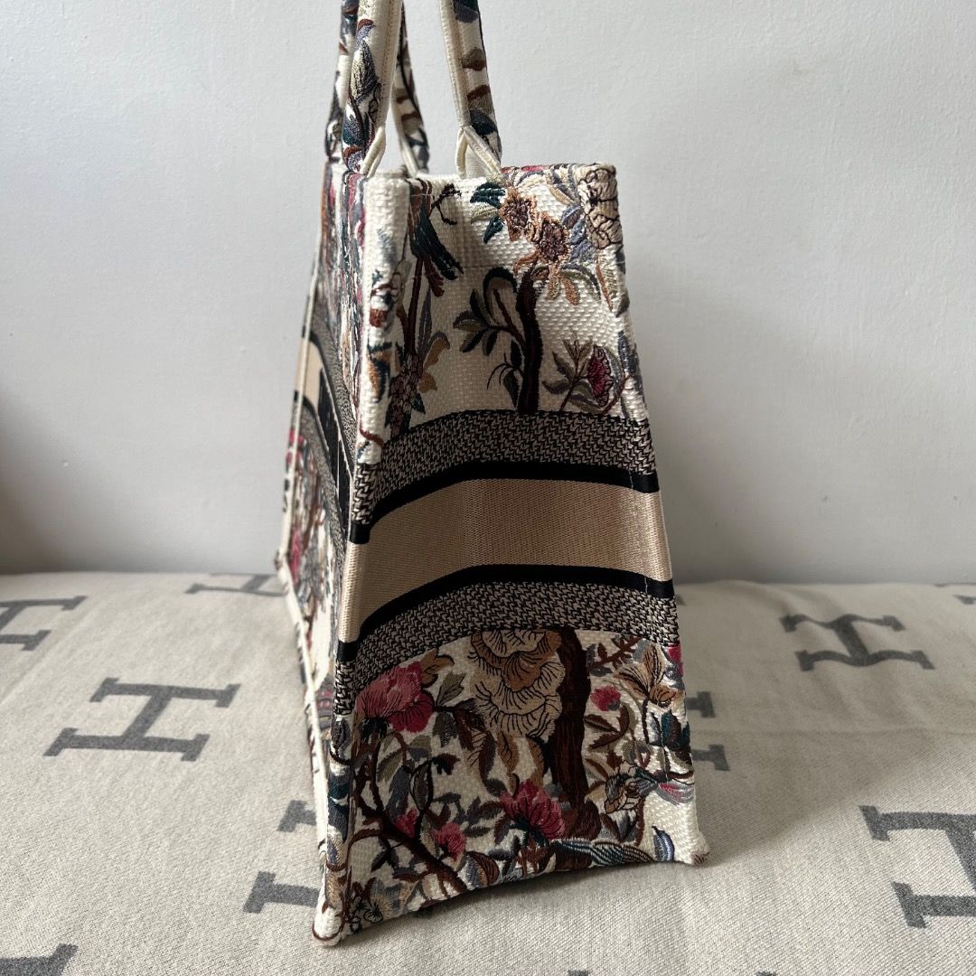 Dior Medium Book Tote Bag (Category: Luxury Bags & Wallets) located in Antipolo. Submitted by chanchimj (Listing ID 1325367736, Image 3). Description: The bag's large size can accommodate a 15-inch laptop, a pouch, a wallet, a phone, sunglasses and lipstick 14 x 11 x 6.5 inches Dust bag included.