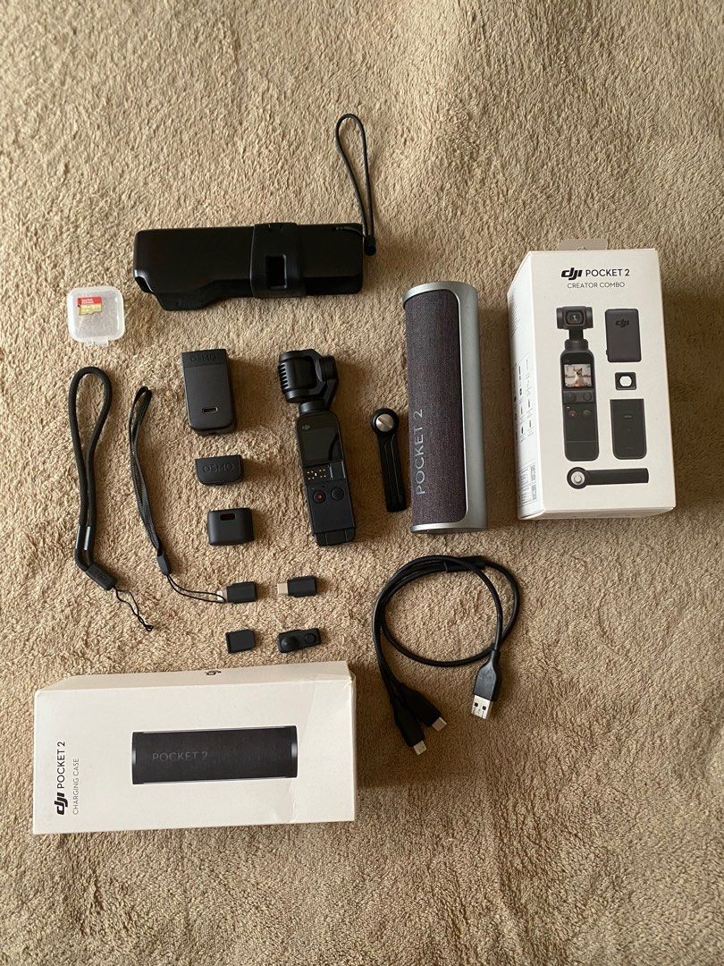 DJI OSMO POCKET 2 (Category: Cameras) located in Pasuquin. Submitted by ydaimogen (Listing ID 1346819842, Image 1). Description: DJI POCKET 2 Creator Combo ✅DJI Pocket 2 ✅Micro Tripod ✅ Mini Control Stick ✅ Tripod Mount ✅USB Splitter Charging Cable ✅ Smartphone Adapter (Ligthning) ✅ Smartphone Adapter (USB-C) ✅ Do-It-All Handle ✅ Wrist Strap Additional Items: ✅ Original DJI Pocket 2 Charging Case (org price- 5k) ✅ Extra Wrist Strap ✅ 128 GB Sandi