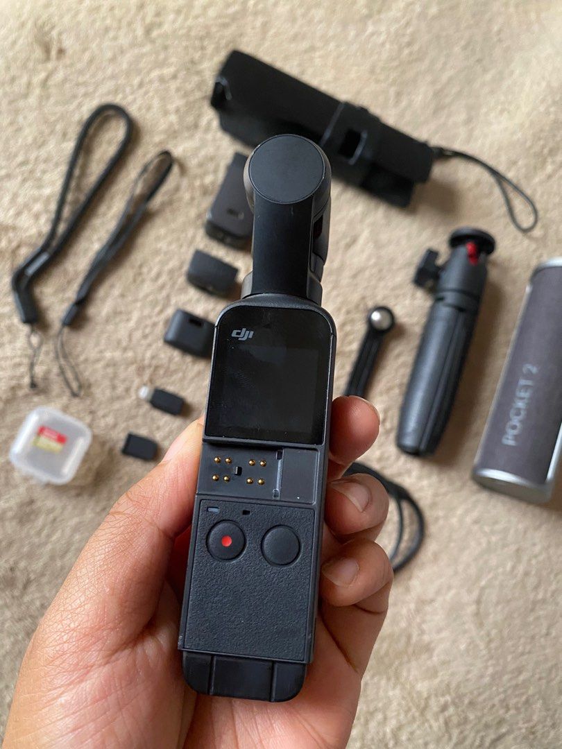 DJI OSMO POCKET 2 (Category: Cameras) located in Pasuquin. Submitted by ydaimogen (Listing ID 1346819842, Image 3). Description: DJI POCKET 2 Creator Combo ✅DJI Pocket 2 ✅Micro Tripod ✅ Mini Control Stick ✅ Tripod Mount ✅USB Splitter Charging Cable ✅ Smartphone Adapter (Ligthning) ✅ Smartphone Adapter (USB-C) ✅ Do-It-All Handle ✅ Wrist Strap Additional Items: ✅ Original DJI Pocket 2 Charging Case (org price- 5k) ✅ Extra Wrist Strap ✅ 128 GB Sandi