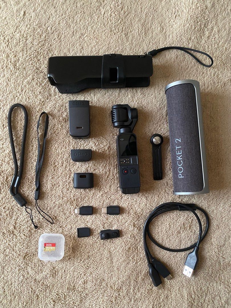 DJI OSMO POCKET 2 (Category: Cameras) located in Pasuquin. Submitted by ydaimogen (Listing ID 1346819842, Image 2). Description: DJI POCKET 2 Creator Combo ✅DJI Pocket 2 ✅Micro Tripod ✅ Mini Control Stick ✅ Tripod Mount ✅USB Splitter Charging Cable ✅ Smartphone Adapter (Ligthning) ✅ Smartphone Adapter (USB-C) ✅ Do-It-All Handle ✅ Wrist Strap Additional Items: ✅ Original DJI Pocket 2 Charging Case (org price- 5k) ✅ Extra Wrist Strap ✅ 128 GB Sandi