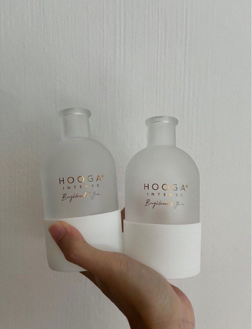 Empty hooga diffuser bottles (Category: Other Home Decor) located in Singapore. Submitted by fashionistarx (Listing ID 1346838208, Image 1). Description: Great for house deco and flowers. I have 8 currently, and can expect more coming. Rubber base is detachable. 1 for $3. Price negotiable for bulk buy and free used reeds.