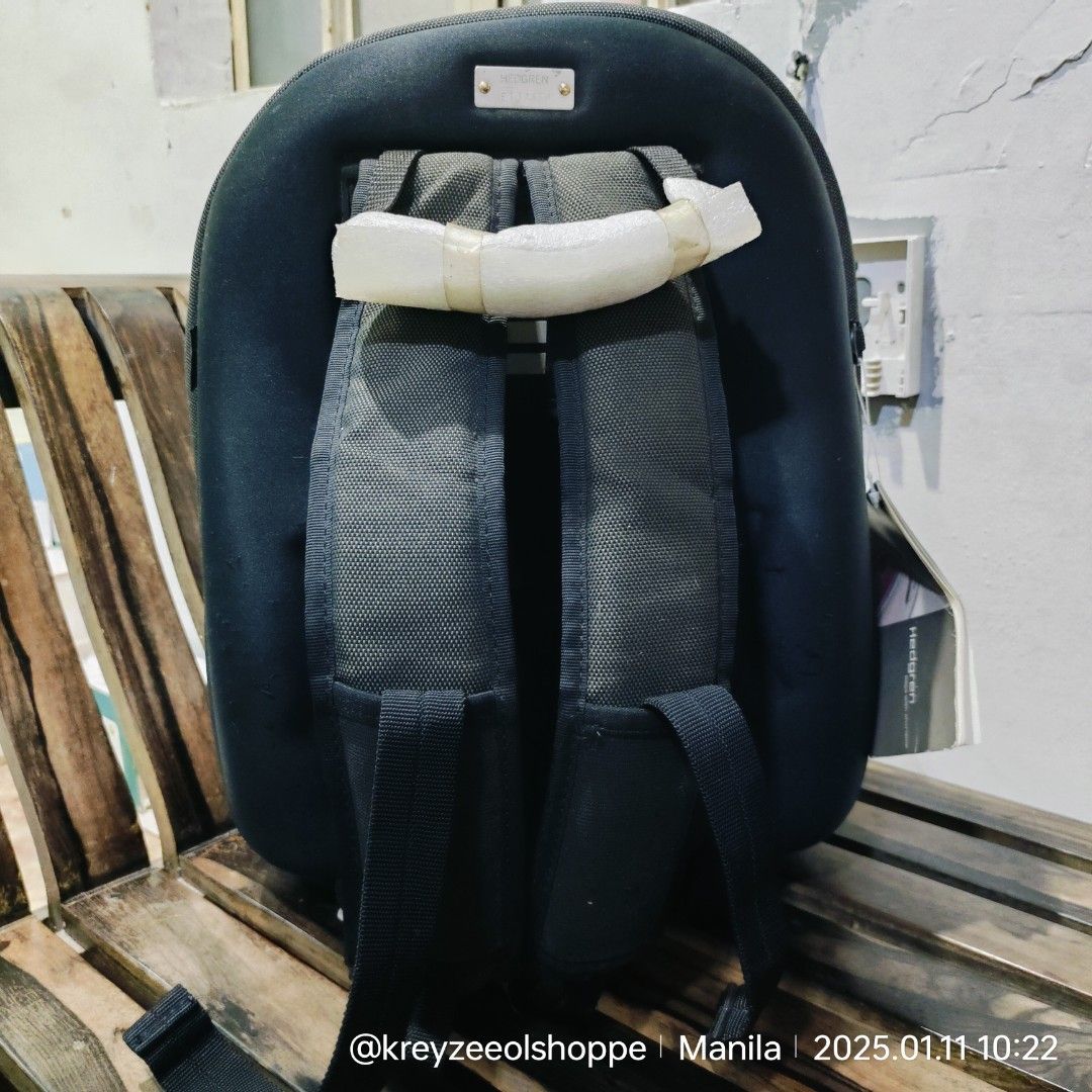 Hedgren Backpack (Category: Backpacks) located in Manila. Submitted by smiley_a (Listing ID 1346683772, Image 2). Description: Excellent condition with the exception of the zipper pulls already replaced. described below. Nylon and Neoprene Fitted firm shell on back side. Soft shell on front. Lots of compartments This is a smaller size bag. Approximate measurements: 14" Tall 11" wide 6" deep This will fit a small laptop or tablet approx 11" x 10" 