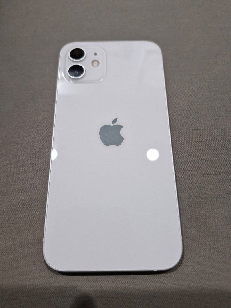 iPhone 12 (Category: iPhone 12 Series) located in Pasig City. Submitted by goodies_from_yesterday (Listing ID 1346795486, Image 3). Description: PLEASE READ: Used but not abused iPhone 12. The unit has no issue. Everything is perfectly working well from cam, screen, wifi, signal, audio. THE UNIT HAS NO PHYSICAL OR TECHNICAL ISSUE/S. Unit is covered with protective screen film ~80-90% smoothness quality. No history of repair. Globe locked 77% batt