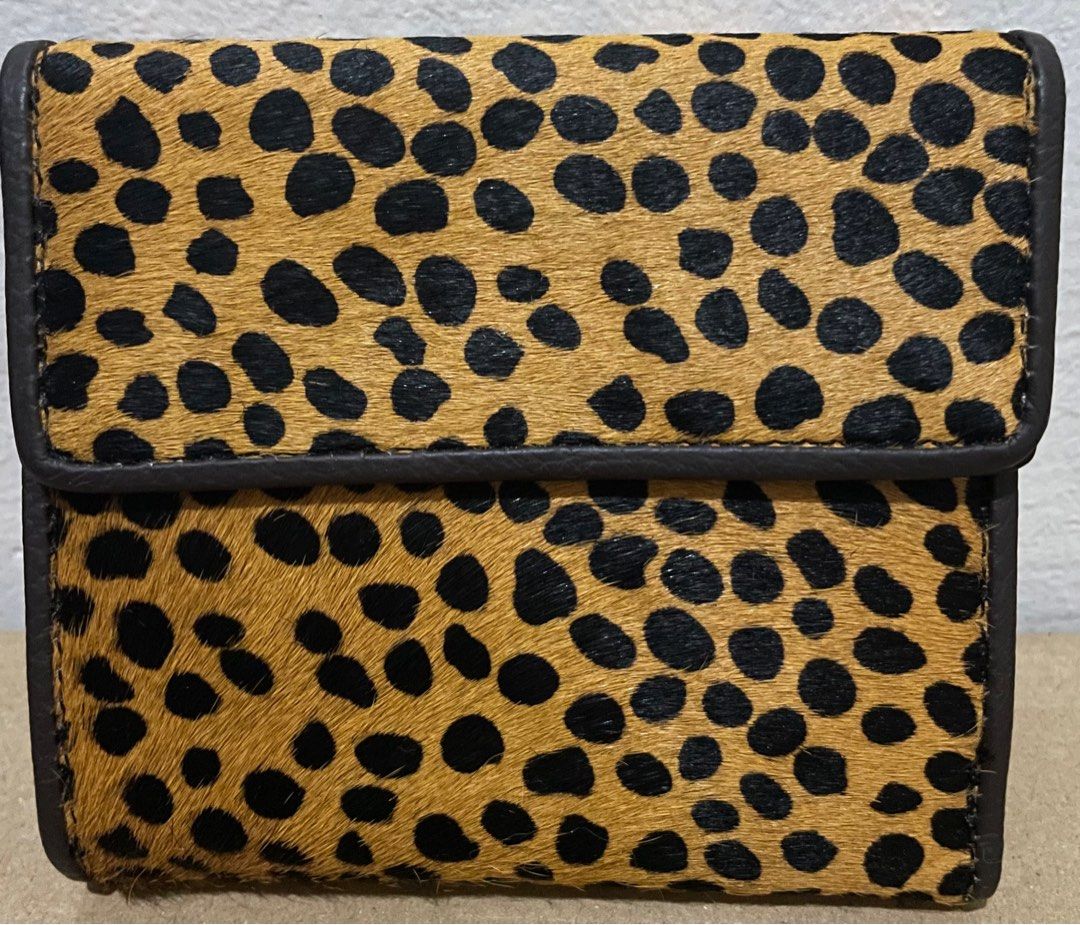 Leopard Fur small tri fold wallet (Category: Luxury Bags & Wallets) located in Pasig City. Submitted by lilhermes (Listing ID 1346834266, Image 1). Description: Leopard fur trifold small wallet, super ganda .