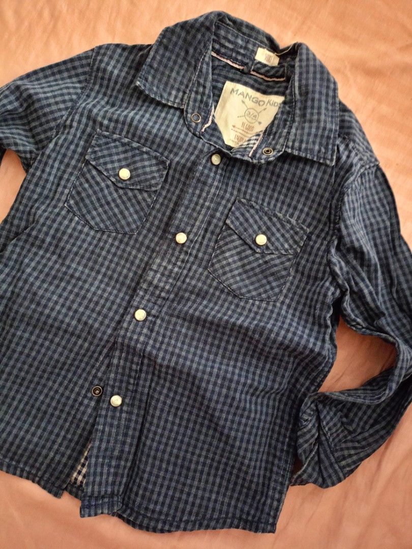 Mango Toddler Cotton Long Sleeves (Category: Babies & Kids Fashion) located in Cebu City. Submitted by maxs.things (Listing ID 1346754365, Image 1). Description: dark blue gingham. thick fabric. made in Bangladesh. well loved. from my son's closet. size 3-4..