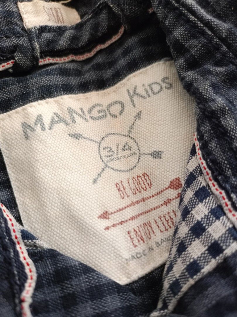 Mango Toddler Cotton Long Sleeves (Category: Babies & Kids Fashion) located in Cebu City. Submitted by maxs.things (Listing ID 1346754365, Image 2). Description: dark blue gingham. thick fabric. made in Bangladesh. well loved. from my son's closet. size 3-4..