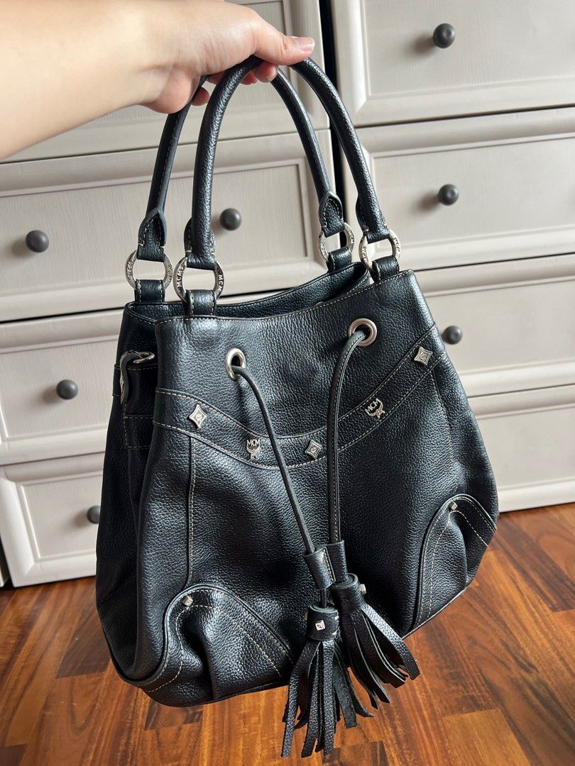 AUTHENTIC MCM HOBO BAG (Category: Luxury Bags & Wallets) located in Quezon City. Submitted by declutterluxury (Listing ID 1346726401, Image 1). Description: 💯 Authentic MCM Hobo Bag • No long strap but the handle drop is long enough as a shoulder bag • 11x12x5 in, handle drop is 6 1/4 in • Still in excellent condition • Very rarely used, around less than 10 times only 📍 Scouts Area QC ✔️ ALL SALES ARE FINAL.