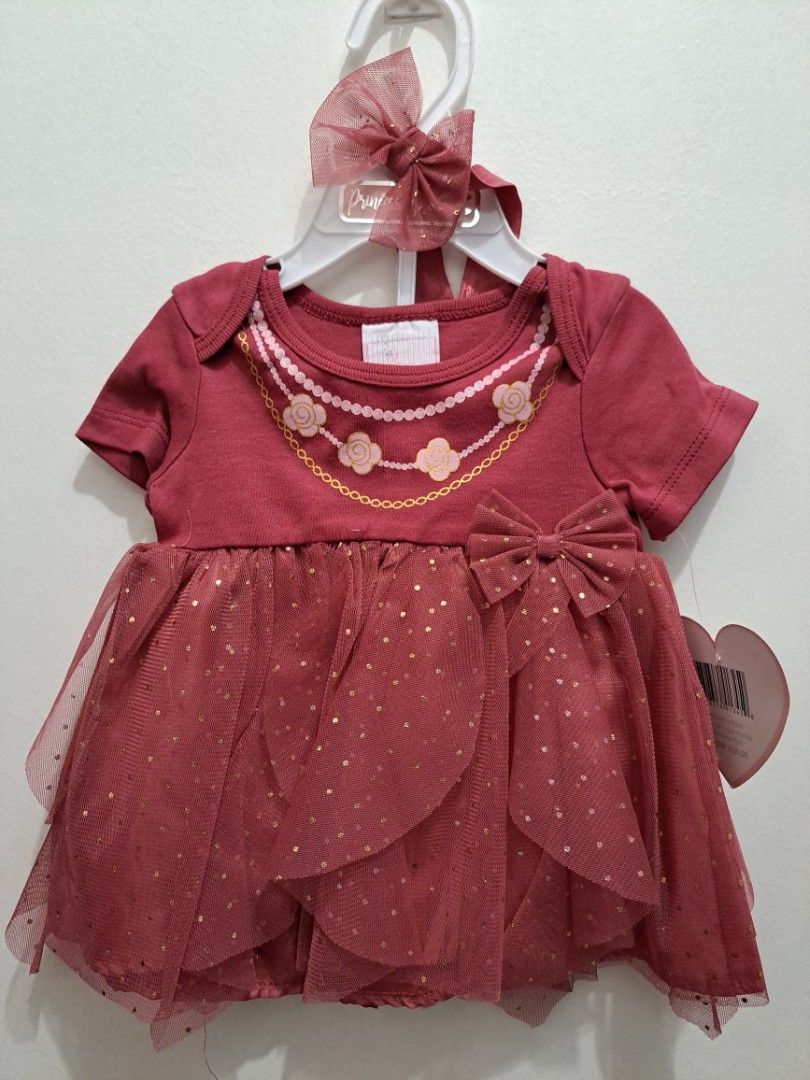 Necklace Tutu Dress 6/9M (Category: Babies & Kids Fashion) located in Makati City. Submitted by _tealover (Listing ID 1346669700, Image 1). Description: Brand new with hanger and tag 6/9M on tag Headband tutu dress bloomer set.