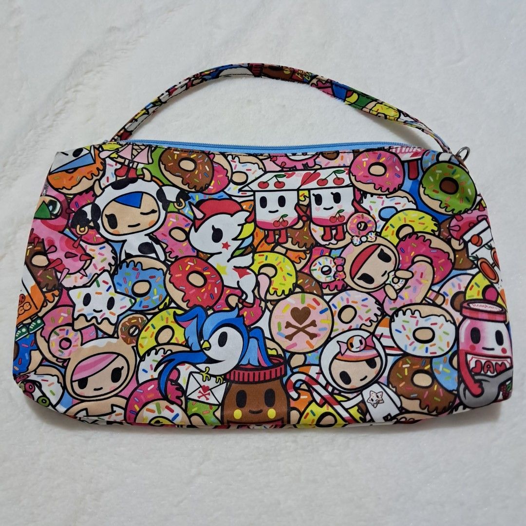 Preloved Jujube Be Quick - Tokipops (Category: Diaper Bags & Wetbags) located in Pasig City. Submitted by mommaof3ph (Listing ID 1346837390, Image 2). Description: Preloved VGUC Jujube Be Quick Tokidoki Collection Sushi Cars Bag only - short strap attached to one end ✅️1st Owner ✅️Still crisp ✅️Vibrant Color ✅️Original Plastic Packaging and tags included ❌️No Penmarks Flaw/s: may corner wears but very small lang barely noticeable please note that