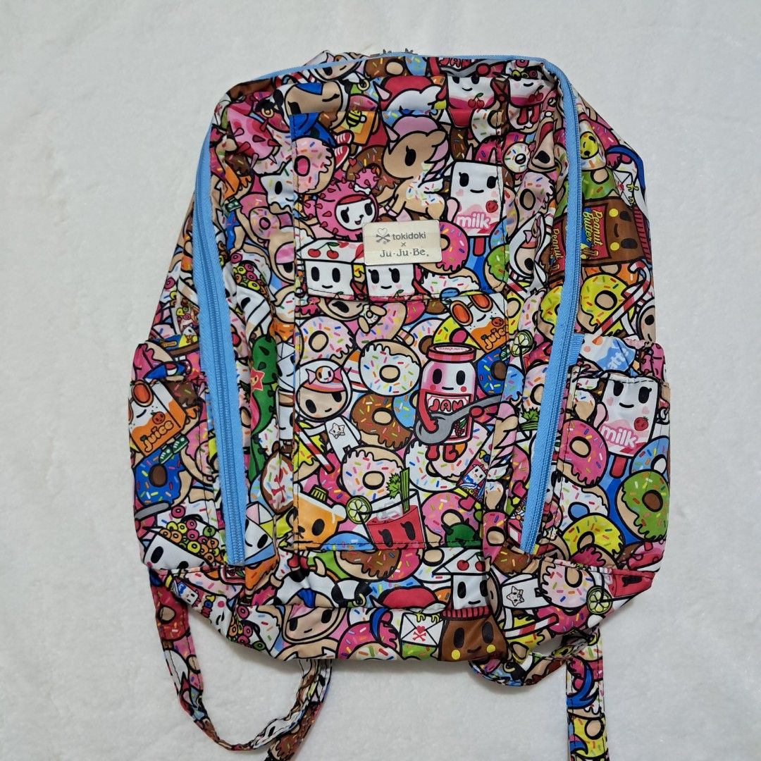 Preloved Jujube MiniBe - Tokipops (Category: Diaper Bags & Wetbags) located in Pasig City. Submitted by mommaof3ph (Listing ID 1346836061, Image 1). Description: Preloved VGUC Jujube MiniBe Tokidoki Collection Tokipops Bag only - No Inclusion ✅️1st Owner ✅️Still Crisp ✅️Vibrant Color ✅️Original Plastic Packaging and tags included ❌️No Holes ❌️No Visible Damage Flaw/s: May faint penmark ng ballpen sa loob pero baka makuha sa laba and natanggal na 
