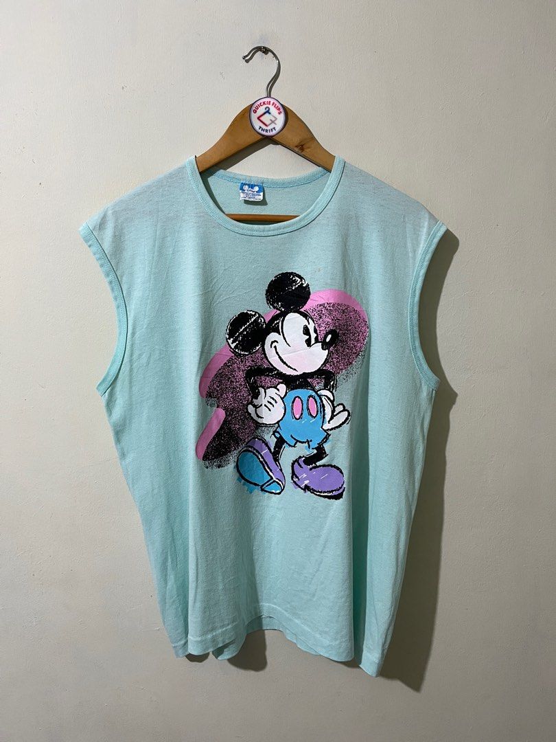 Vintage 80s Mickey Mouse Sleeveless Tee (Category: Tshirts & Polo Shirts ) located in Subic. Submitted by quickieflips (Listing ID 1346730516, Image 3). Description: Vintage 80s Mickey Mouse Sleeveless Shirt 80s Disney Characters Fashion tag Made in USA Single stitch (hem) Super beefy collar / neckline Size: Extra large Dimension: 22” x 26.5” No issue / good as new 400 php Shipping fee will be shouldered by the buyer Location: Olongapo / Subic.