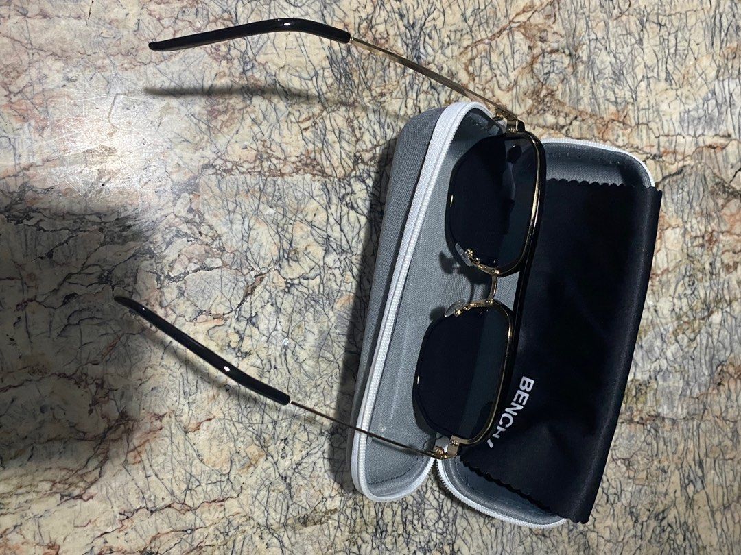 Bench Style Sunglasses (Category: Sunglasses & Eyewear) located in San Pablo. Submitted by itemsplus (Listing ID 1346923523, Image 2). Description: Almost New Bench Style Sunglasses in Gold Frame with cleaning cloth and hardcase. ₱750 via GCash Thru J&T. .