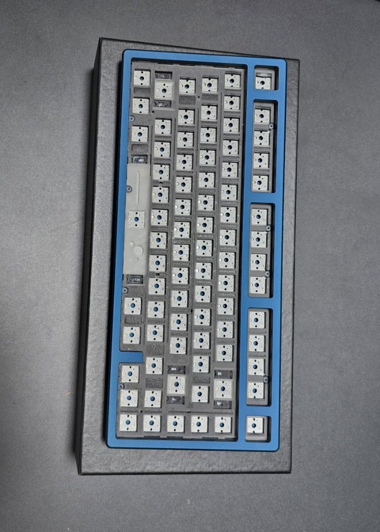 Bubble75 Custom Keyboard (Category: Computer Keyboard) located in Singapore. Submitted by yrahcax (Listing ID 1346936734, Image 3). Description: Bubble75 with PC Plate in Navy Blue with Gold Weight Colorway Includes Durock v2 stabs, which are among the best in the market. Creamy and Thocky Sound Profile Gasket mount QMK/VIA Compatible 6°Typing Angle and Hotswap Poron Dampening pads WTS/WTT Bubble75 is a fantastic option for those looking to dip t