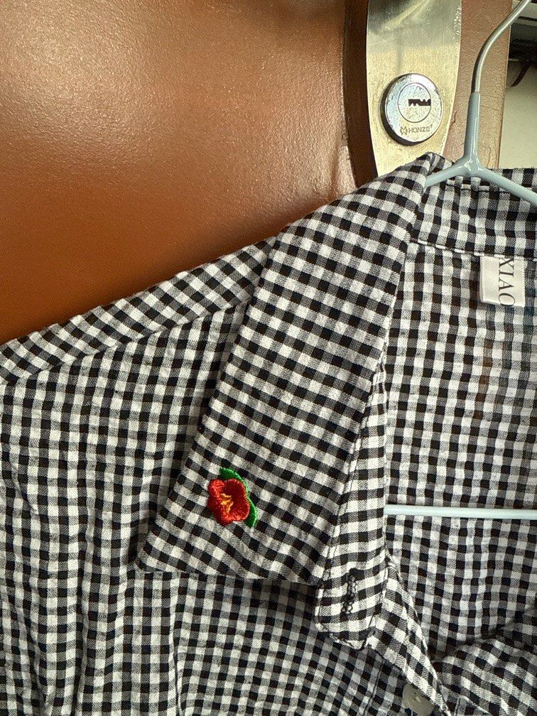 B&W checkered with floral embroidery (Category: Blouses) located in Makati City. Submitted by jppajarillo (Listing ID 1346873472, Image 3). Description: Bought from korea Size M-L Really cute with white bottoms .