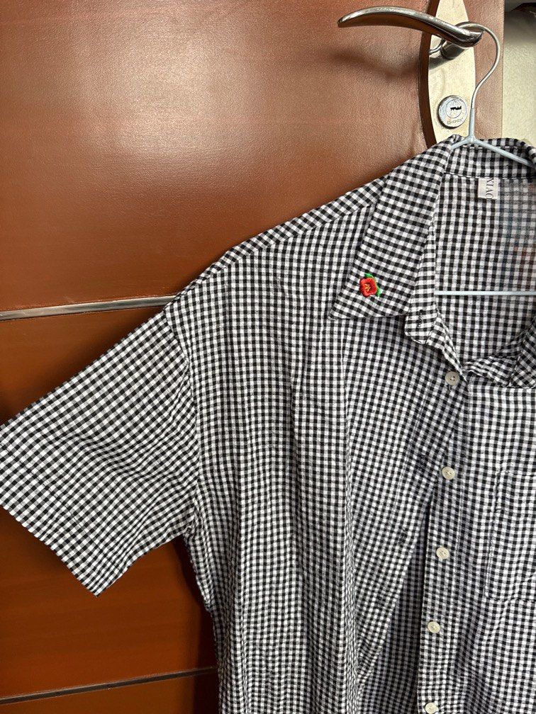 B&W checkered with floral embroidery (Category: Blouses) located in Makati City. Submitted by jppajarillo (Listing ID 1346873472, Image 2). Description: Bought from korea Size M-L Really cute with white bottoms .