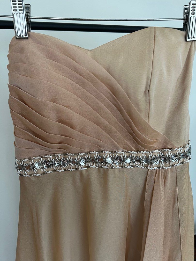 Custom Made Peach Strapless Gown Dress (Category: Evening dresses & gowns) located in Makati City. Submitted by imajillyfish (Listing ID 1346967185, Image 2). Description: Please see photos for the condition of the gown :) the tastas is on the hem and not super seen when it touches the floor. .