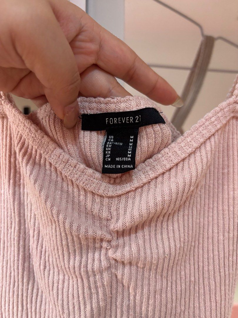 Forever 21 Pink Spaghetti Strap Crop Trendy Top (Category: Sleeveless) located in Manila. Submitted by shopkioneph (Listing ID 1347056916, Image 2). Description: Forever 21 Pink Spaghetti Strap Crop Top – Trendy and stylish, perfect for warm days or layering. A must-have for your casual or chic looks!.