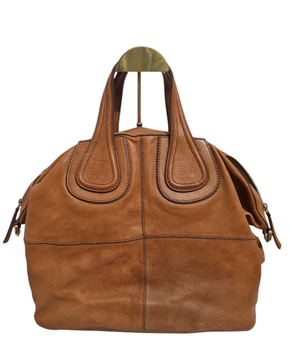 Givenchy Nightingale 💯% Authetic (Category: Luxury Bags & Wallets) located in Binan City. Submitted by mcsolis (Listing ID 1346976975, Image 2). Description: With detachable strap and dust bag Comes with auth certificate In good condition Japan ukay/surplus What you see is what you get.