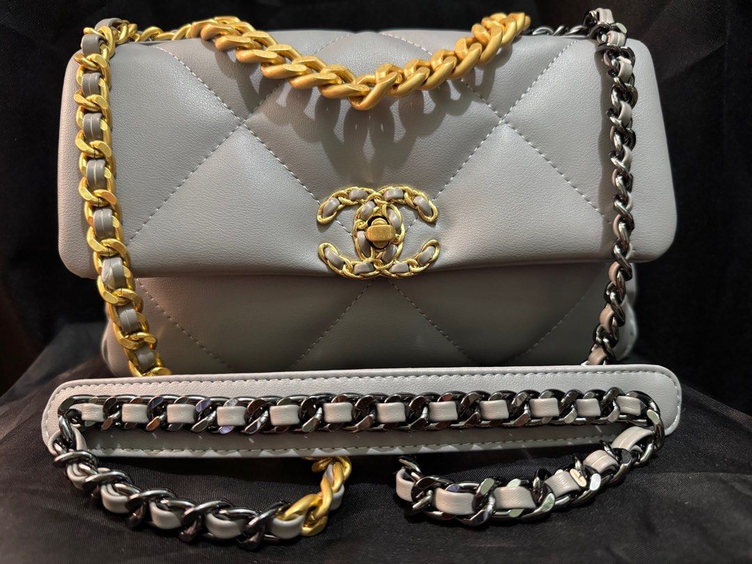 Preloved : C h a n e l - C 1 9 (Category: Luxury Bags & Wallets) located in Pasig City. Submitted by catch.your.style (Listing ID 1346873992, Image 2). Description: DM me if you need more photos of the bag. This is coded with holo sticker inside. With dust bag, no box included. 💟Please manage you expectations for this is a preloved bag, thank you.💟.