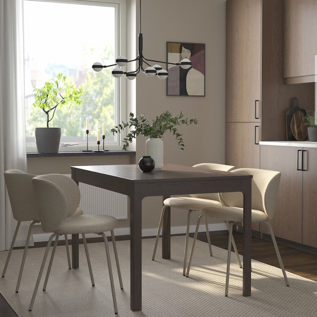 IKEA Extendable Dining Table (Category: Tables & Sets) located in Singapore. Submitted by mtw119 (Listing ID 1346881521, Image 2). Description: IKEA As-is Ekedalen, dark brown, one of the legs slightly chipped (see photo) .