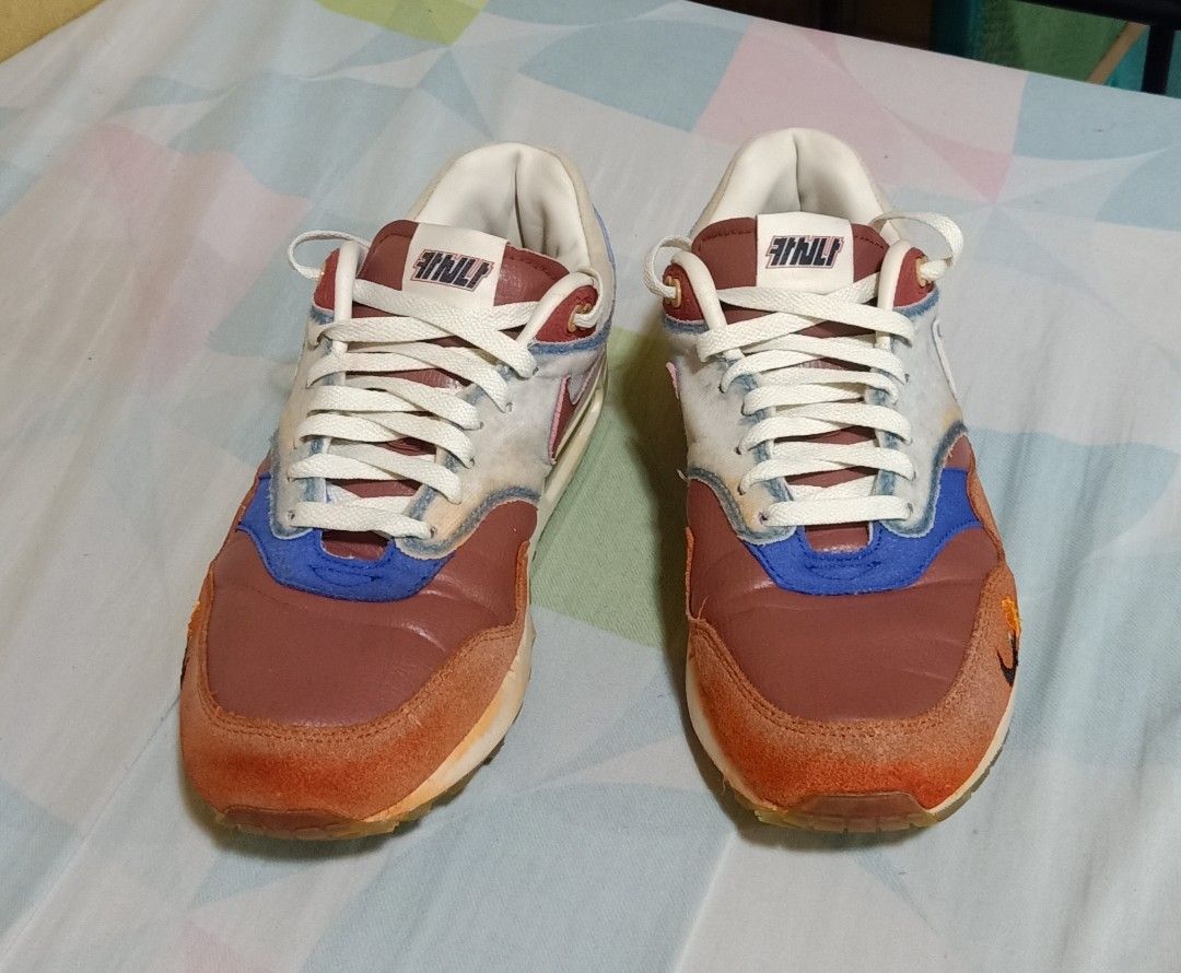 KASINA AIR MAX 1 'WON-ANG ORANGE (Category: Sneakers) located in Quezon City. Submitted by trick1892 (Listing ID 1346888001, Image 3). Description: Size: 9.5 Authentic Issue: kupas na yung original sa kulay Konting heel drags at toe drags 9/10 condition Pm po sa sure buyer May bawas pa po.