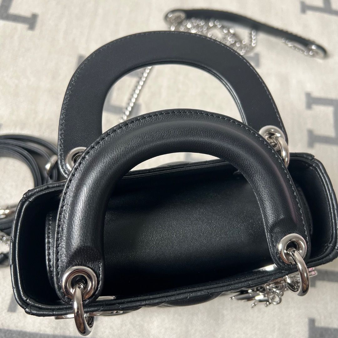 Mini Lady Dior Bag Black Cannage Lambskin (Category: Luxury Bags & Wallets) located in Antipolo. Submitted by chanchimj (Listing ID 1338798780, Image 3). Description: Featuring a removable chain shoulder strap, the miniature Lady Dior bag can be carried by hand or worn crossbody as an ideal evening wear companion. 17 x 15 x 7 cm.