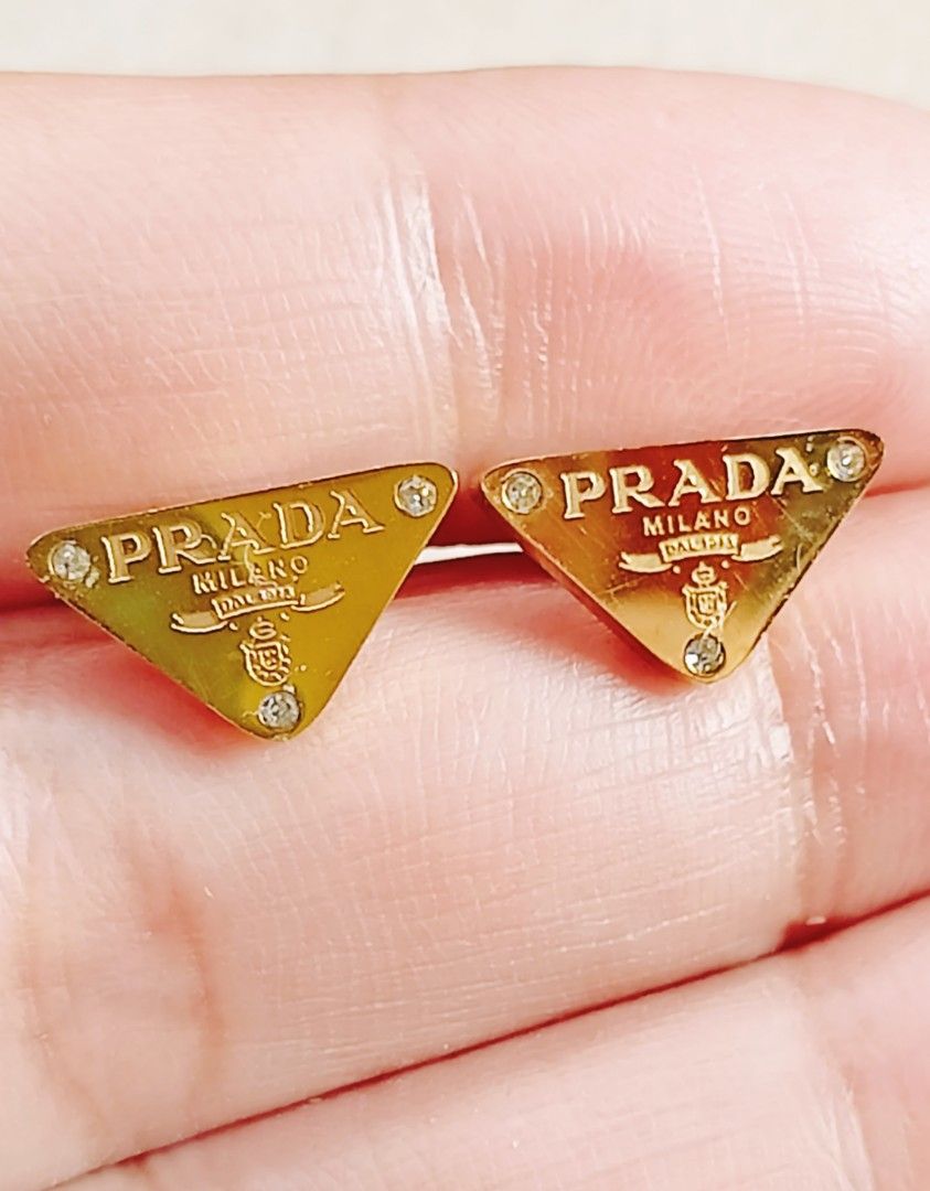 Prada earrings from japan (Category: Luxury Accessories) located in Quezon City. Submitted by liambags (Listing ID 1346878941, Image 1). Description: Prada earrings from japan no flaws with stamp with gift box kindly pm me.