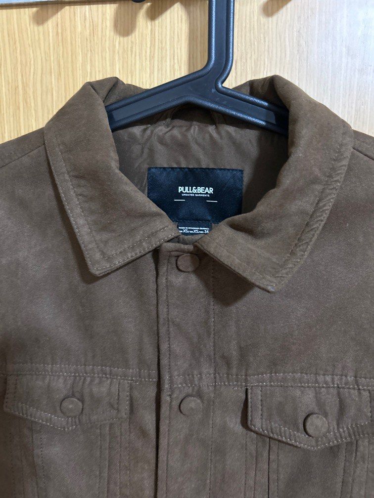 Pull & Bear Suede Jacket (Category: Coats, Jackets and Outerwear) located in Singapore. Submitted by jerald_yeo (Listing ID 1346982572, Image 2). Description: Colour: Brown Material: Suede.