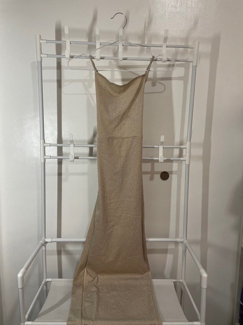 Sparkly Tieback Champagne Long Backless Dress (Category: Dresses) located in Batangas. Submitted by p.dmnl (Listing ID 1346901026, Image 1). Description: - when worn pics on the last 2 slides (on size XS) - no stains - has a few runs on the back strings - length: 48.5 inches - fits XS-Semi-medium.
