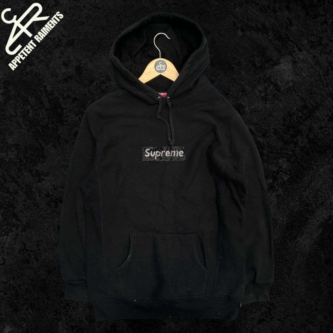 Supreme x Swarovski Box Logo Hoodie Pullover (Category: Coats, Jackets and Outerwear) located in Baguio. Submitted by appetentraiments (Listing ID 1347006718, Image 1). Description: Excellent condition Dimensions: 29”Lx22”Wx23”SL M on tag, fits L 9/10 color rate No issues Needs wash.