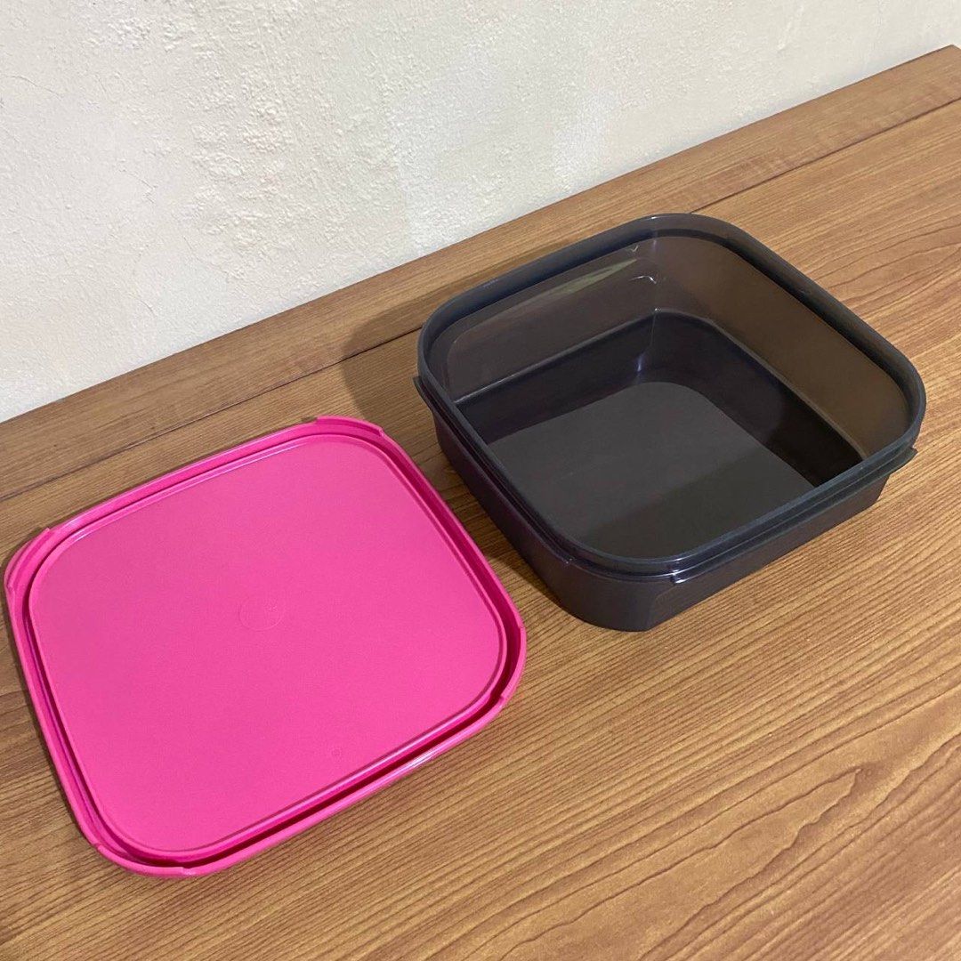 TUPPERWARE BLACK PINK SQUARE CONTAINER (1L) (Category: Food Organization & Storage) located in Quezon City. Submitted by xtian.store (Listing ID 1347081305, Image 3). Description: TUPPERWARE BLACK PINK SQUARE CONTAINER (1L) BRAND NEW AND ORIGINAL 7 x 7 inches Height: 2.5 inches.