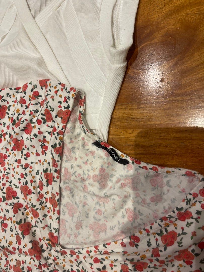 Bundle of 4 Tops Size M-L (Category: Blouses) located in Quezon City. Submitted by _byktin (Listing ID 1347197967, Image 3). Description: Bundle of 4 Tops Size M-L 1) White Floral Halter Top 2) Lovito Multicolored Backless Halter Top Size M 3) Lovito White Cutout Tank Top Size M 4) Terranova Floral V-Neck Scrunched Top Size L.