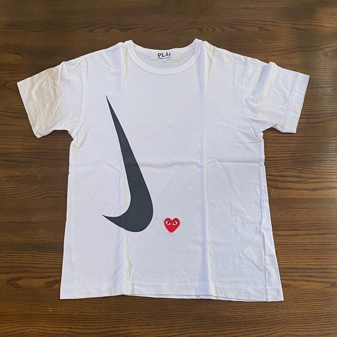 Comme des Garçons x Nike Shirt (Category: Tshirts & Polo Shirts ) located in Quezon City. Submitted by base7 (Listing ID 1347082473, Image 1). Description: Pre-Loved / Well Used Size L Fits Medium SRP: Php 11,352.