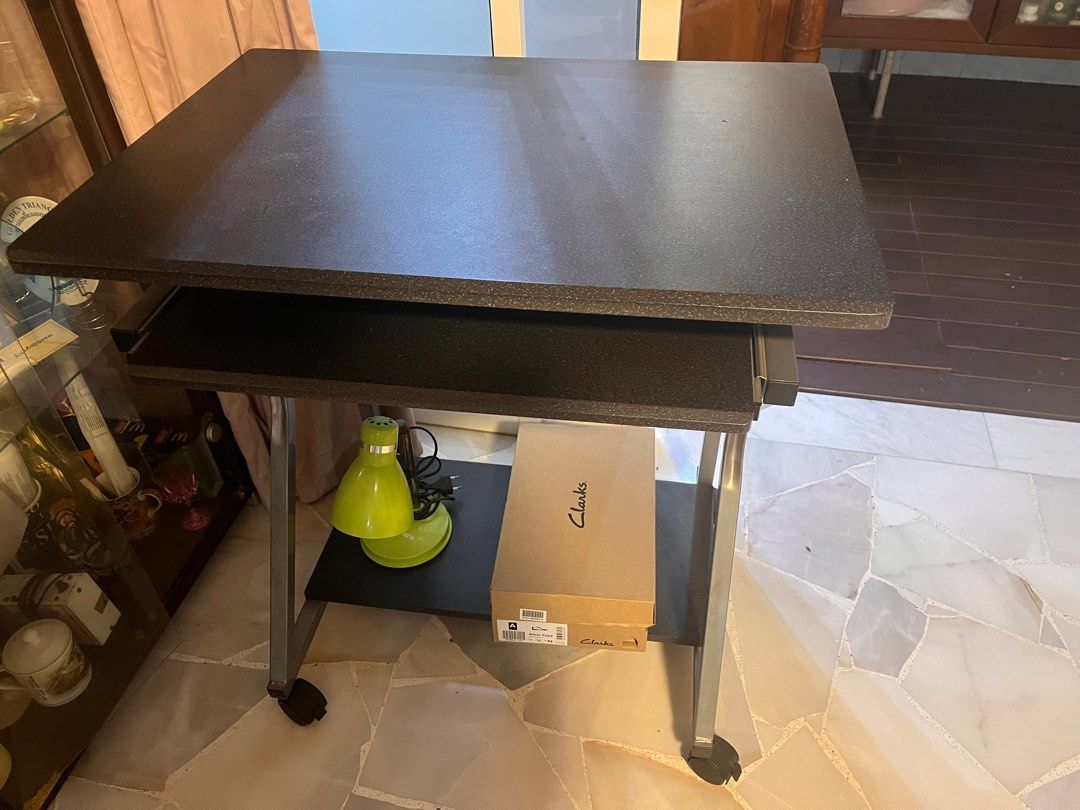 Computer Table (Category: Tables & Sets) located in Singapore. Submitted by juniper (Listing ID 1347212358, Image 1). Description: Pls use shoe box to estimate table size. Has roller wheels. You can roll it away .