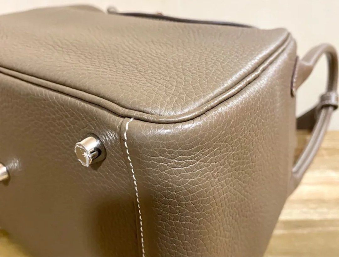 Hermes Lindy 26 Etoupe SHW (Category: Luxury Bags & Wallets) located in Quezon City. Submitted by __12345 (Listing ID 1347153783, Image 3). Description: - Preorder (2 weeks eta) - 9.5/10 very good condition - Stamp C - Includes dustbag, box, receipt (2018) - Entrupy available upon request - Available for meet ups/delivery - Detailed photos available upon request - Guaranteed authentic or money back! Open to sourcing requests! Send us a message 💌