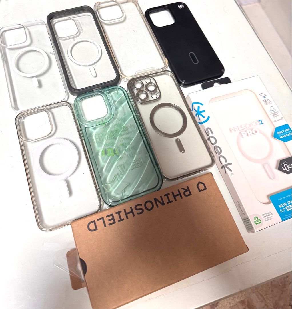 iPhone 15 Pro Max Cases (Category: iPhone 15 Series) located in Pasig City. Submitted by thejcstore (Listing ID 1347224613, Image 3). Description: Speck - 1,500 Rhino Shield - 1,200 Clear Acrylic - 200 Metallic silver - 200 Green - 100 Bumper clear- 50 .