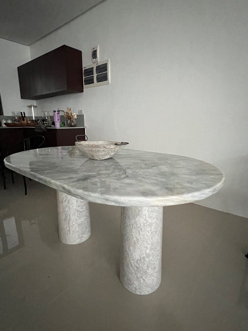 Marble dining table (Category: Tables & Sets) located in Quezon City. Submitted by hometherapyph (Listing ID 1347266890, Image 2). Description: Marble dining table 6 seater 90 by 150 Selling low due to water stains only visible when light hits it .
