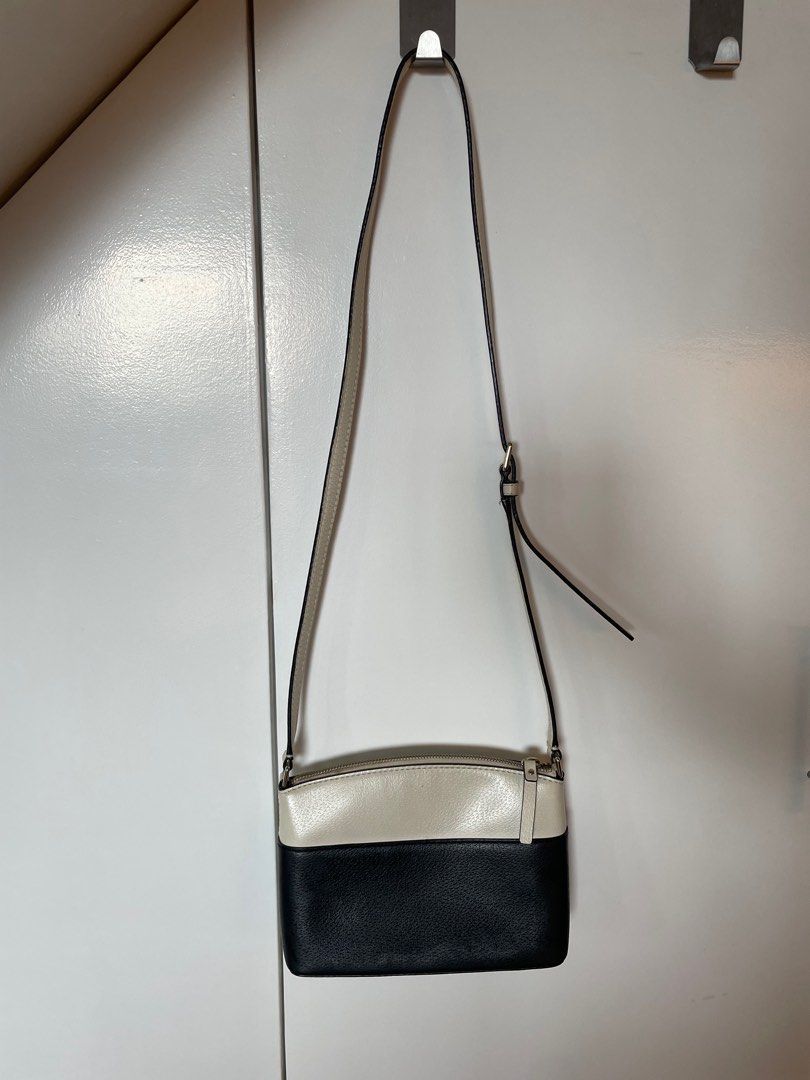 PRELOVED KATE SPADE Shoulder Bag (Category: Luxury Bags & Wallets) located in Taguig. Submitted by secondlifeph (Listing ID 1347110367, Image 3). Description: PRELOVED KATE SPADE BAG Some signs of yellowing due to storage Can be wiped clean No other damage * Can be purchased with original Kate Spade small wallet (last photo) for P4,200 RFS: decluttering MOP: BDO, BPI, GCash, Metrobank SHIPPING care of Buyer: Grab, Lalamove, GOGOXpress .