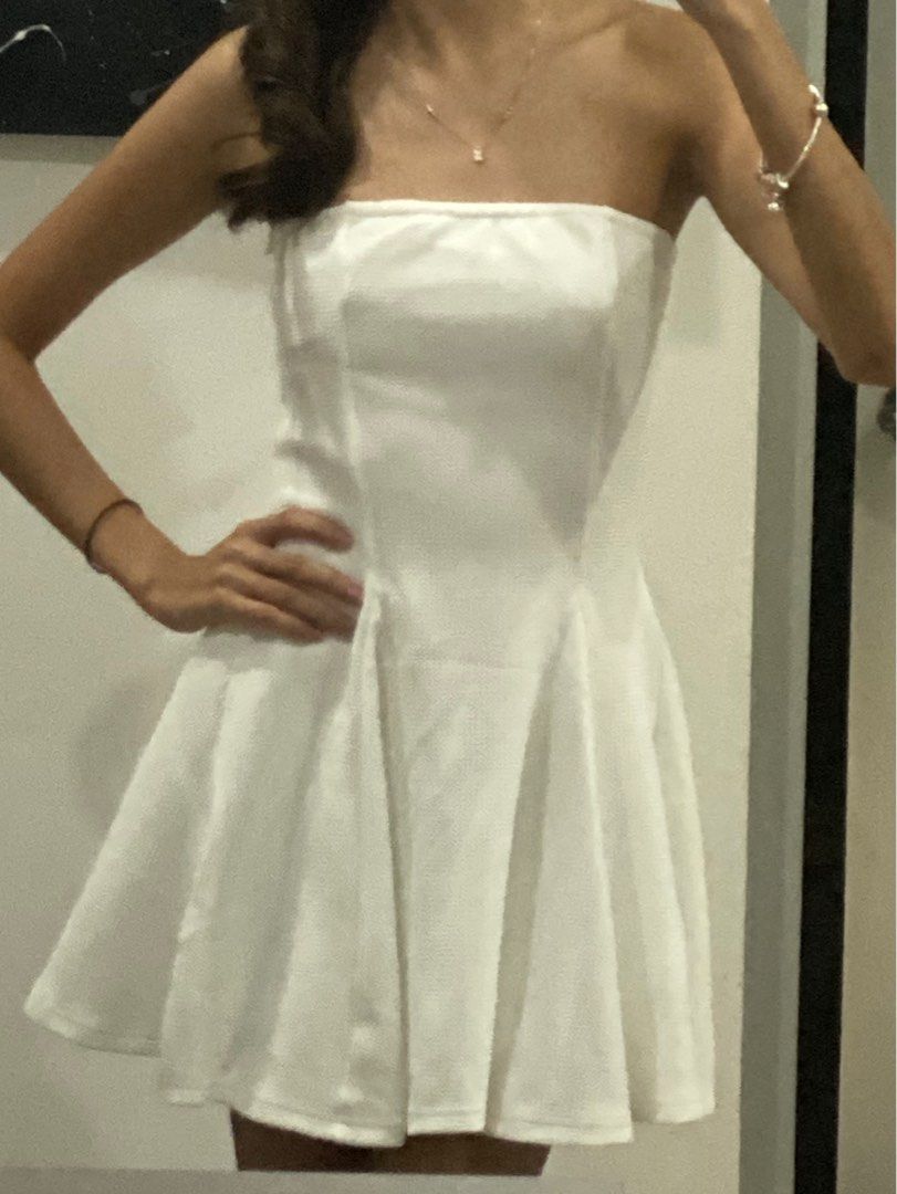 SHEIN White Strapless Flare Dress (Category: Dresses) located in Quezon City. Submitted by goatedls (Listing ID 1347173582, Image 2). Description: - Fabric is stretchy - Used once STRICTLY NO REFUNDS.