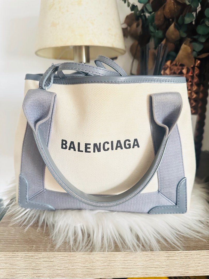 Shoulder/hand bag (Category: Luxury Bags & Wallets) located in Pasig City. Submitted by emashopaholic (Listing ID 1347213791, Image 1). Description: Preloved Authentic Balenciaga tote bag with long strap Canvas material Leather handle With pouch Generic dust bag only Excellent used condition Issue: no strap Location: Pasig Shipping c/o buyer MOP: Online transfer.
