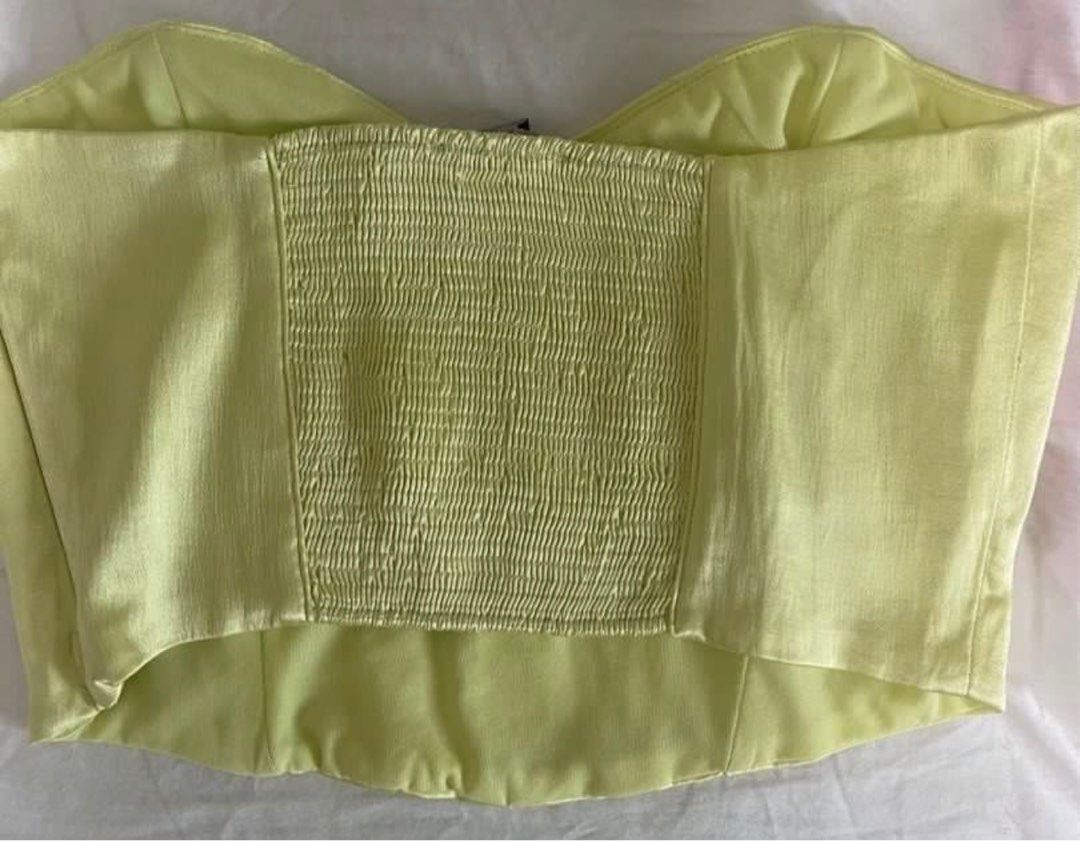 Zara Cropped Tube Corset (Category: Sleeveless) located in Taguig. Submitted by forkeeps_ (Listing ID 1347232600, Image 2). Description: Zara Cropped Tube Corset Super cute light green color Size: S Gartered back, zippered side Shipping shouldered by buyer.