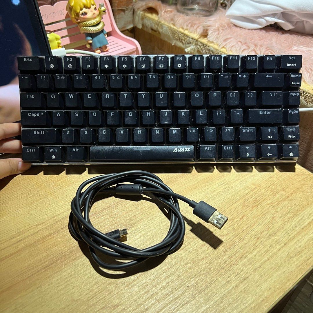 Ajazz | black wired backlit mechanical keyboard (Category: Computer Keyboard) located in Taguig. Submitted by handpickedbyari (Listing ID 1347454193, Image 3). Description: rfs: upgrading ☁️ Inclusions: - keyboard - complete keys - original type c cable (No box but will be packed properly & bubble wrapped) ☁️ Features: - blue switch (non swappable switches) - rgb backlight w/ various modes - wired (not bluetooth) ☁️ price is not nego 📦 j&t/sdd (