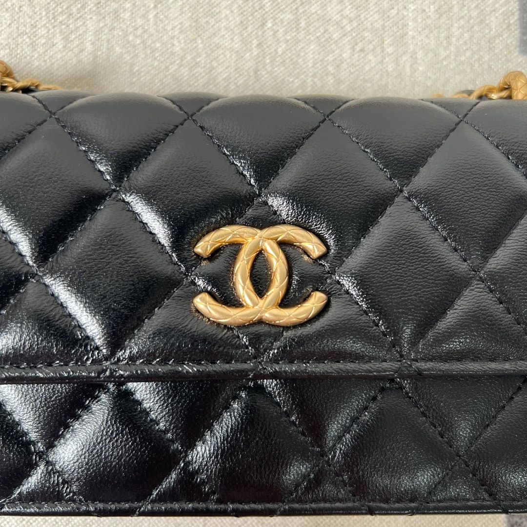 Chanel Flap Black Phone Sling Bag (Category: Luxury Bags & Wallets) located in Antipolo. Submitted by chanchimj (Listing ID 1328048172, Image 3). Description: Dimension: 6.7” x 3.8” x 1” Comes with dust bag and cards.
