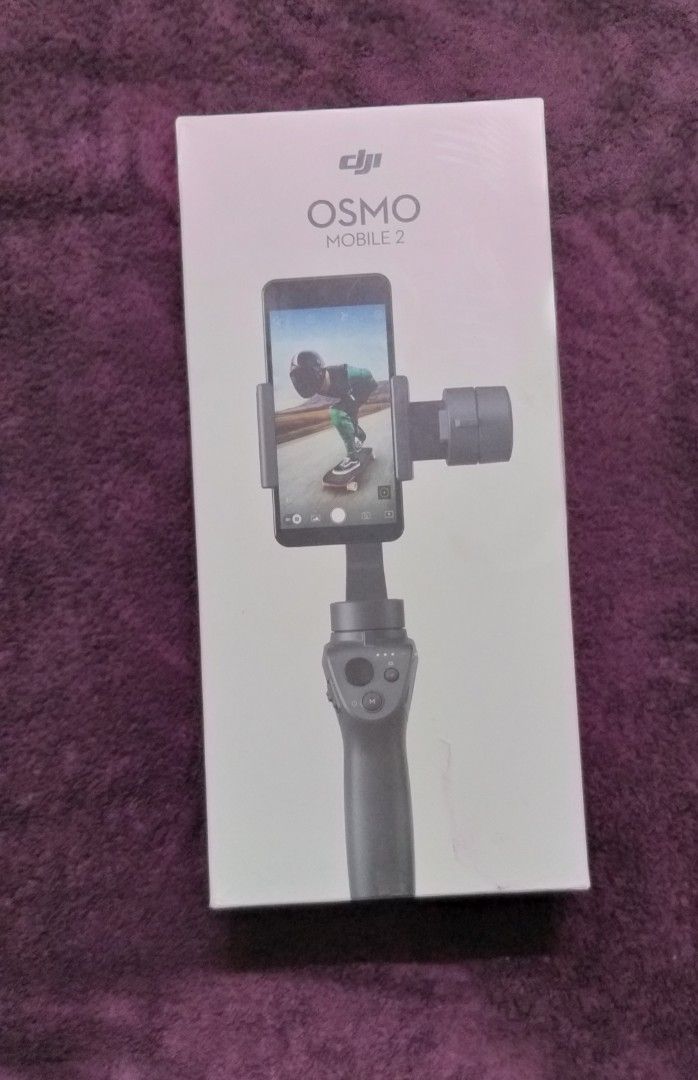 dji OSMO mobile 2 (Category: Mounts & Holders) located in Manila. Submitted by roblazo25 (Listing ID 1347308267, Image 1). Description: pick up lng.