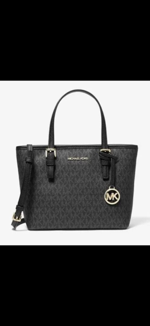 Michael Kors bag (Category: Luxury Bags & Wallets) located in Quezon City. Submitted by godsprince80923 (Listing ID 1347357907, Image 1). Description: Michael Kors Jet Set Travel Extra Small Logo Tote Bag **PVC coated canvas logo print **gold-tone hardware **top zip closure **interior one zip and open slip pockets **exterior back, open slit pocket **logo details **approx. measurements: 8.6" bottom & 10" top(L)/ 7.4"(H)/ 4"(W) ***GENUINE product f