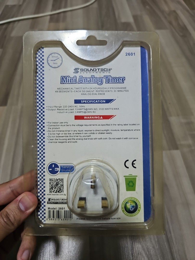 Mini Analog Timer (Category: Electrical, Adaptors & Sockets) located in Singapore. Submitted by juppy1 (Listing ID 1347401260, Image 2). Description: Selling Mini analog timer that is attached to a power adapter. Can be used for auto-cut off for anything your device is plugged into. Never used and never opened before. Bought for $10, selling for $8..