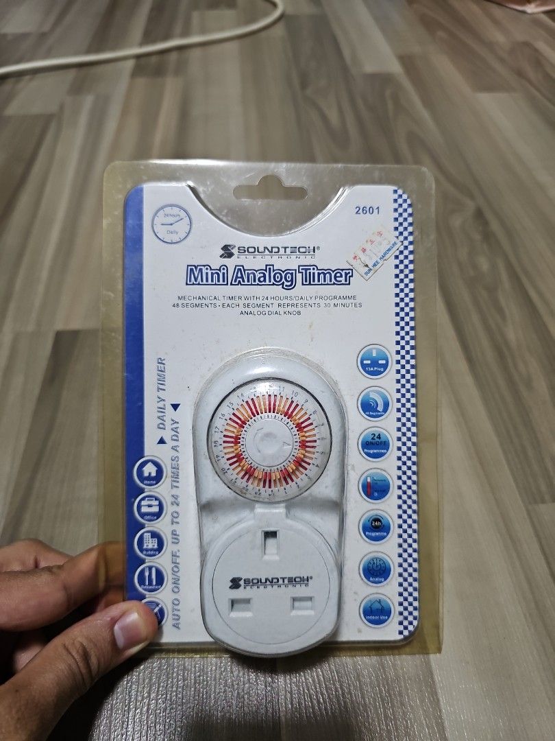 Mini Analog Timer (Category: Electrical, Adaptors & Sockets) located in Singapore. Submitted by juppy1 (Listing ID 1347401260, Image 1). Description: Selling Mini analog timer that is attached to a power adapter. Can be used for auto-cut off for anything your device is plugged into. Never used and never opened before. Bought for $10, selling for $8..