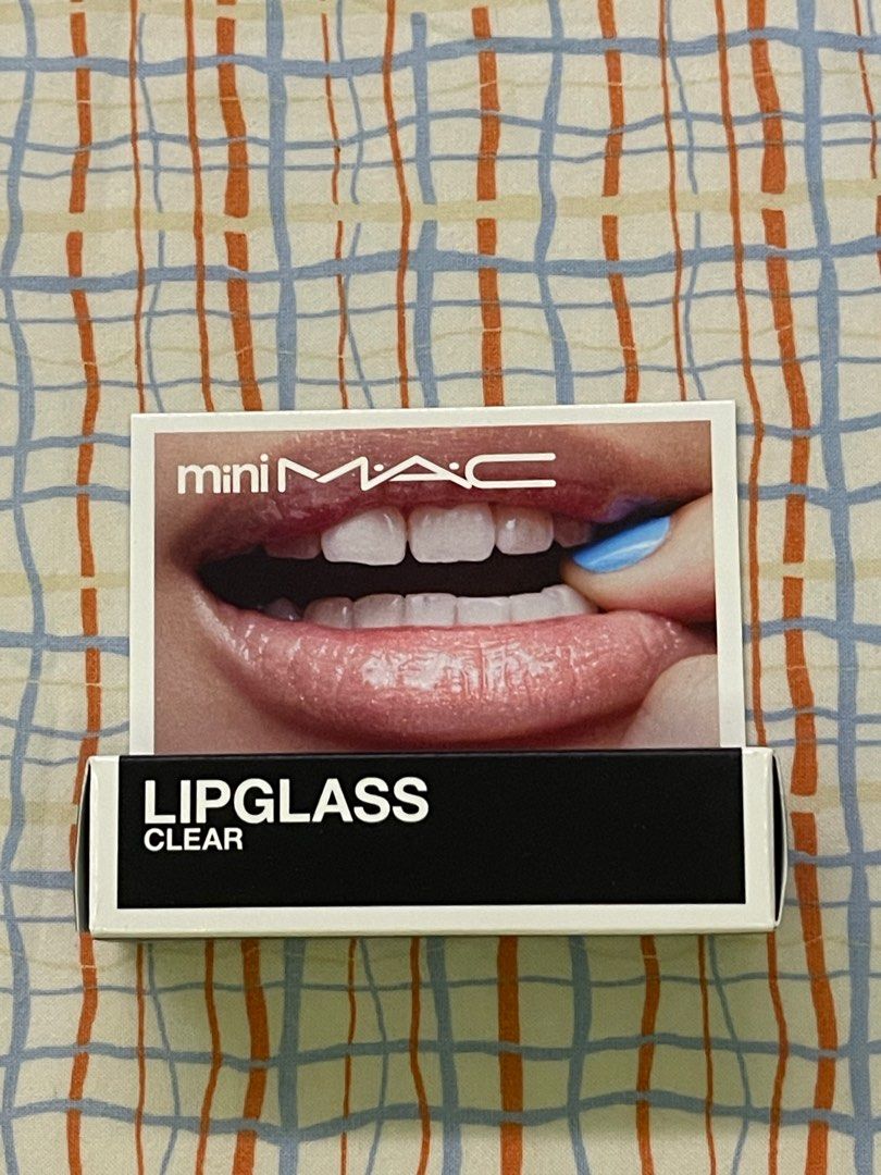 Mini MAC Lipglass (Category: Makeup) located in Quezon City. Submitted by ewyeung (Listing ID 1347416355, Image 1). Description: Mini MAC lipglass Bought from USA Brand new.