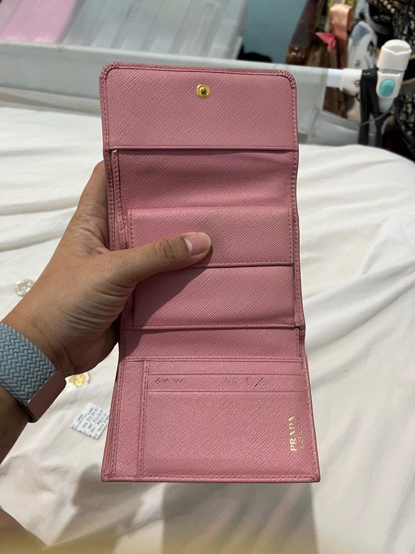 Original Prada wallet (Category: Luxury Bags & Wallets) located in Santa Rosa. Submitted by qualityaunthenticbagsetc (Listing ID 1347470937, Image 2). Description: Rfs :declutter to many wallets No other inclusions Original 100% moneyback.